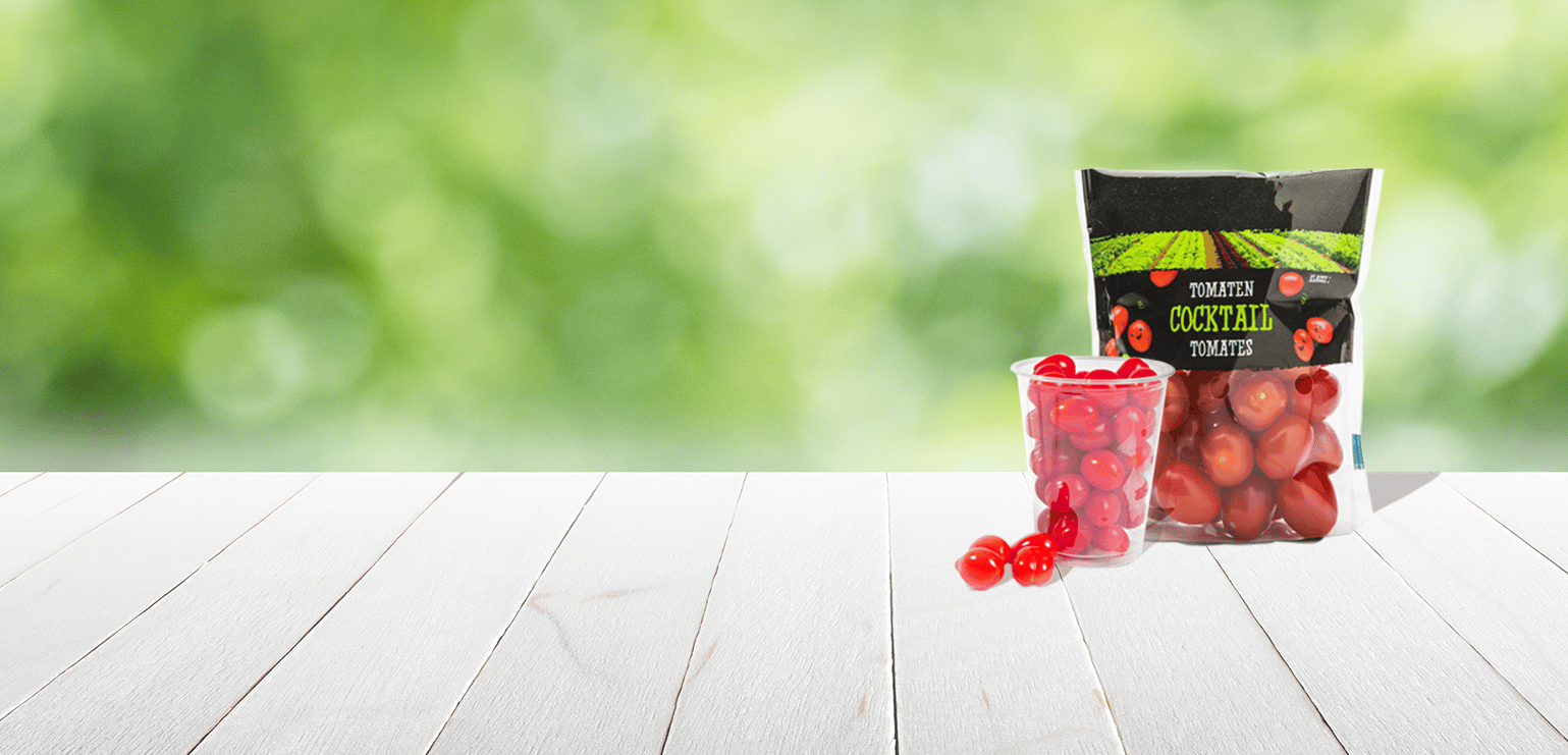 Snack tomatoes packed in a doy-style pouch and shaker cup – innovative tomato packaging solutions from JASA
