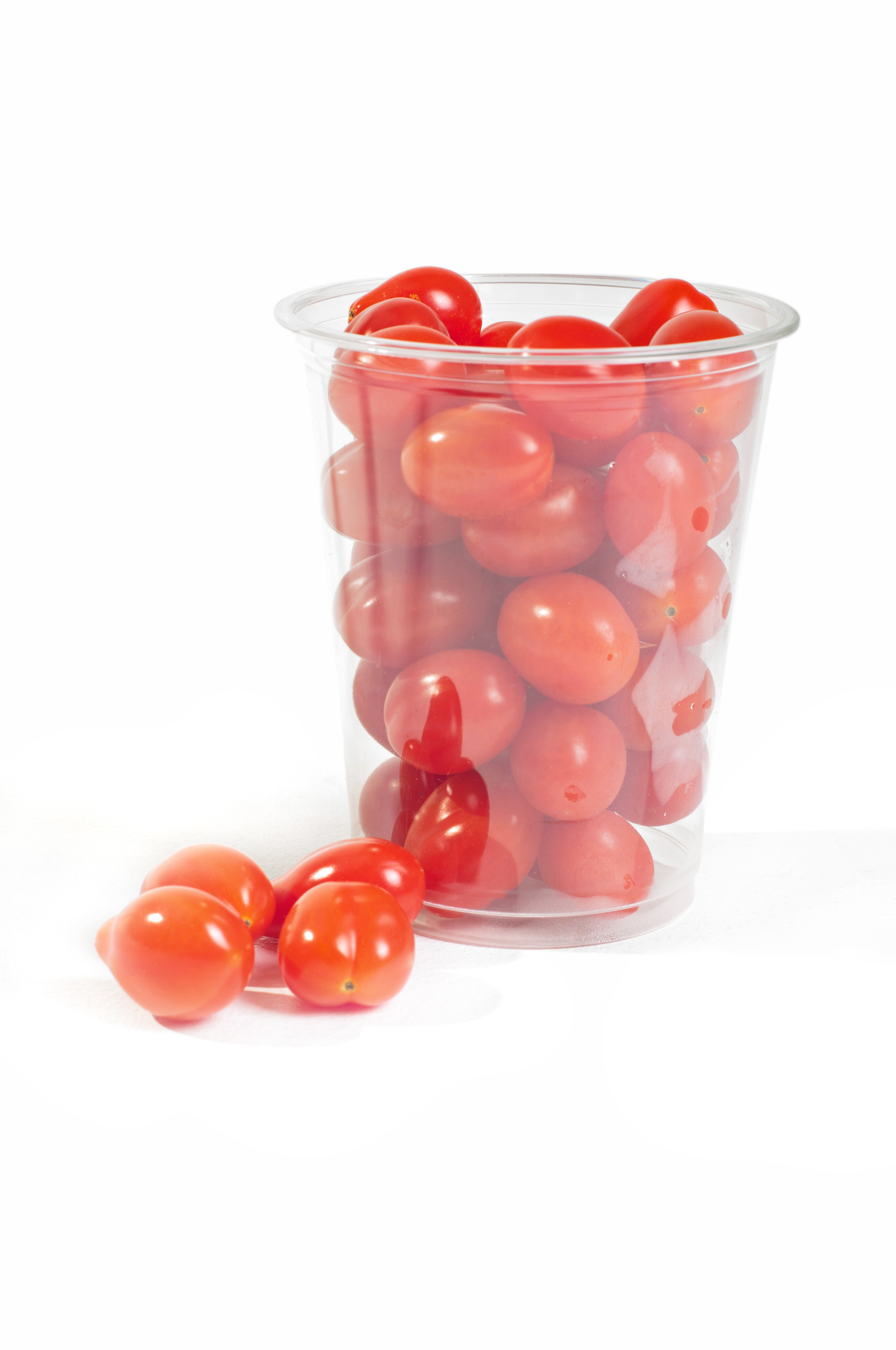 Tomatoes packed in a cup